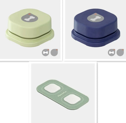 Three pet communication buttons in different colors: a light green square with a bone logo, a dark blue square with a bone logo, and a green rectangular button with two press areas.