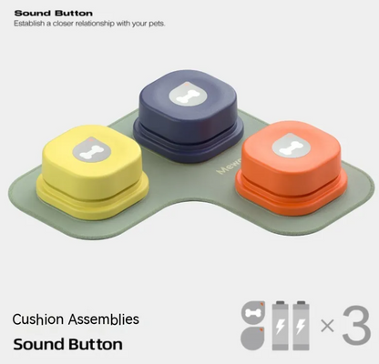 Pet Communication Button set featuring three buttons in yellow, blue, and orange, arranged on a soft green mat.