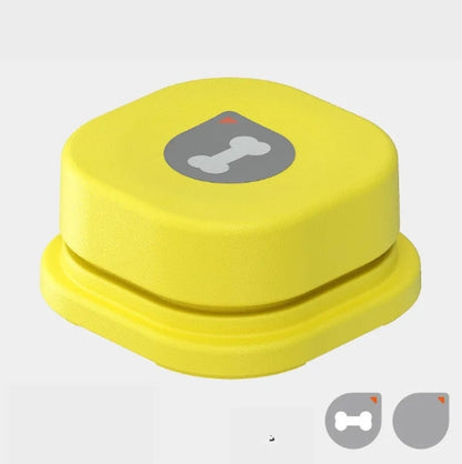 Bright yellow pet communication button with a bone design on top, made from durable ABS plastic, compact for easy handling.