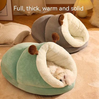 Cozy pet bed slippers in mint green and gray, featuring plush material, semi-enclosed design, and adorable ear accents.