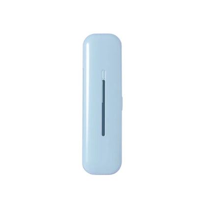 Compact blue Portable UV Toothbrush Sterilizer with a sleek design and a side slot for toothbrush insertion.