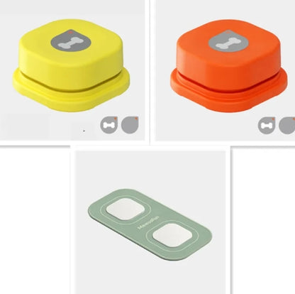 Yellow and orange pet communication buttons with bone icons; gray sticker with two blank recording areas.