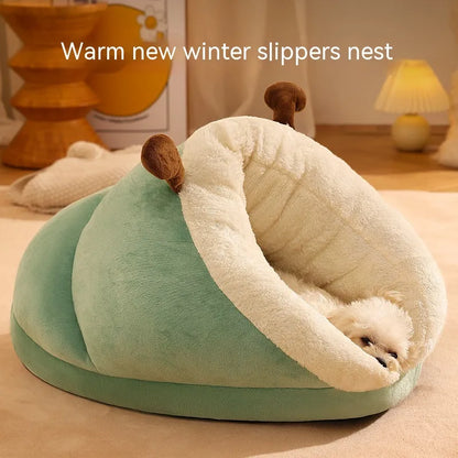 Cozy winter pet bed shaped like a slipper, featuring a soft green exterior and a plush cream interior, ideal for small pets.
