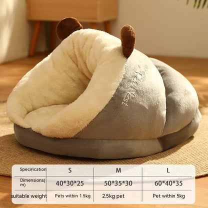Cozy pet bed shaped like a slipper, featuring plush gray and cream materials, with cute brown ears for added charm.