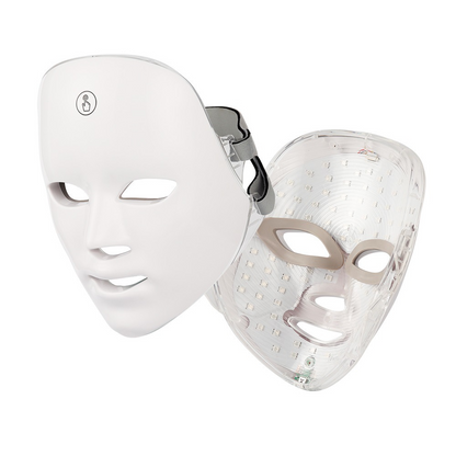 White facial beauty device featuring LED light therapy, with clear and white mask design, adjustable strap on the side.